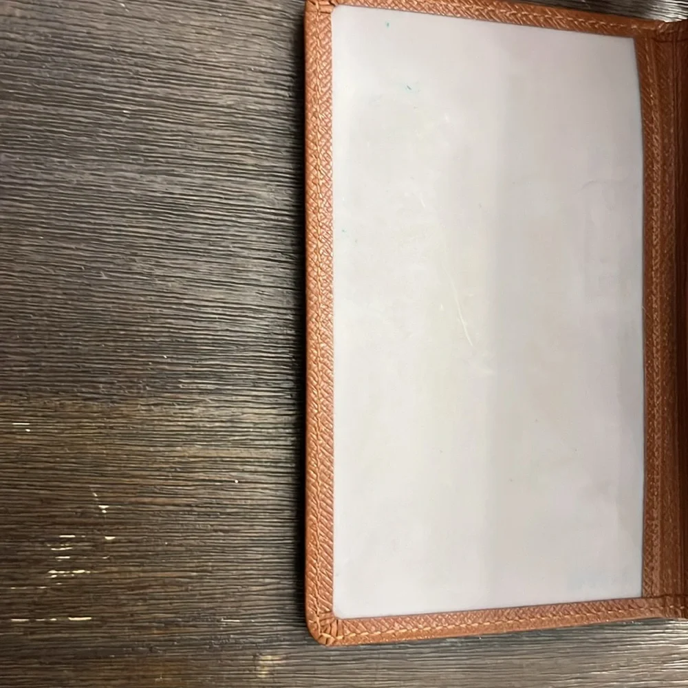 Authentic Louis Vuitton brown taiga leather bifold card I.D. Holder